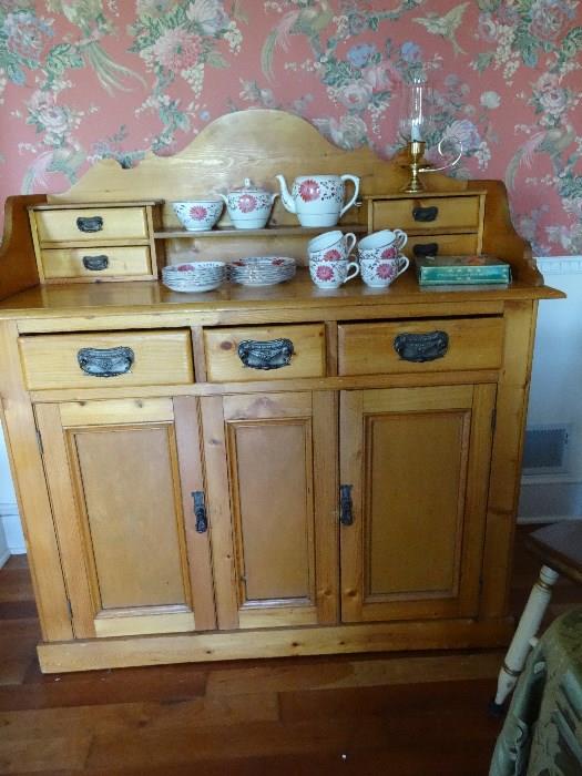 Antique sideboard of pine. English luster ware hand painted. 