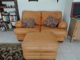 Seally Leather Loveseat with Ottoman and 6 matching pillows ( pillows leather on backside)