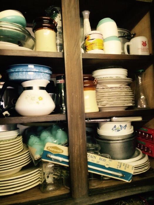 Lots of dishes and corning ware and glasses