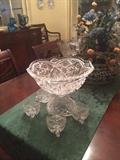    Punch bowl & cups; green runner; floral arrangement
