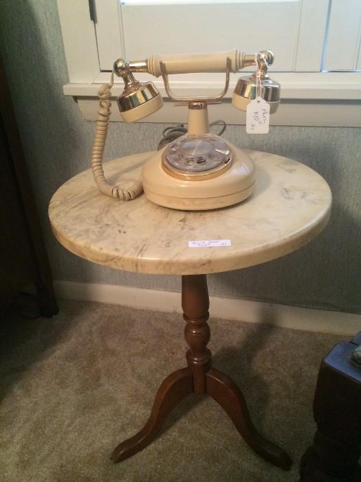     Small side table with unique telephone