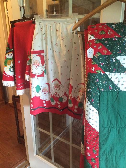       Christmas tree skirts, apron, and quilt