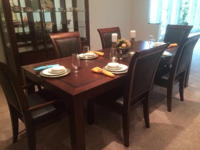 American Drew Dining Table with 6 Wood and Black Leather Chairs - Matching Sideboard and Glass Display Hutch