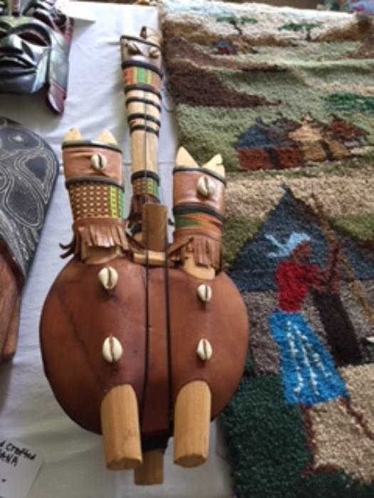 African Instrument with leather hanger