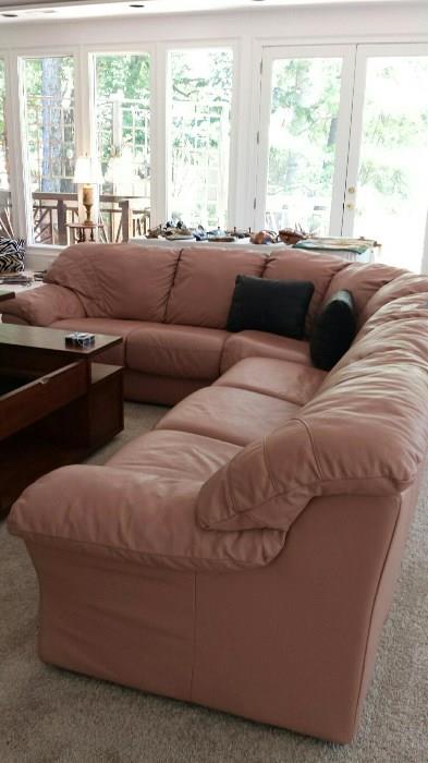 Sectional, Italian Leather, good clean condition, muted rose color, 3 pieces (2 seat, center seat, 3 seat) 2 black leather pillows.