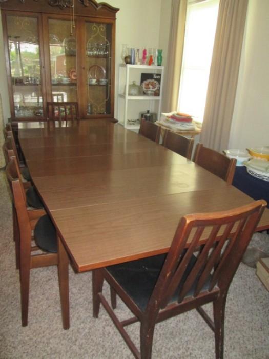 Nice mid century modern style dining table - can seat up to 8. 