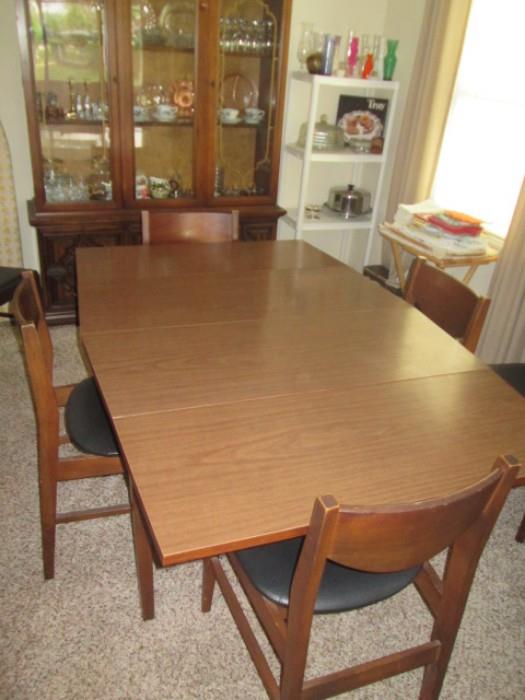 Dining table configured for 4
