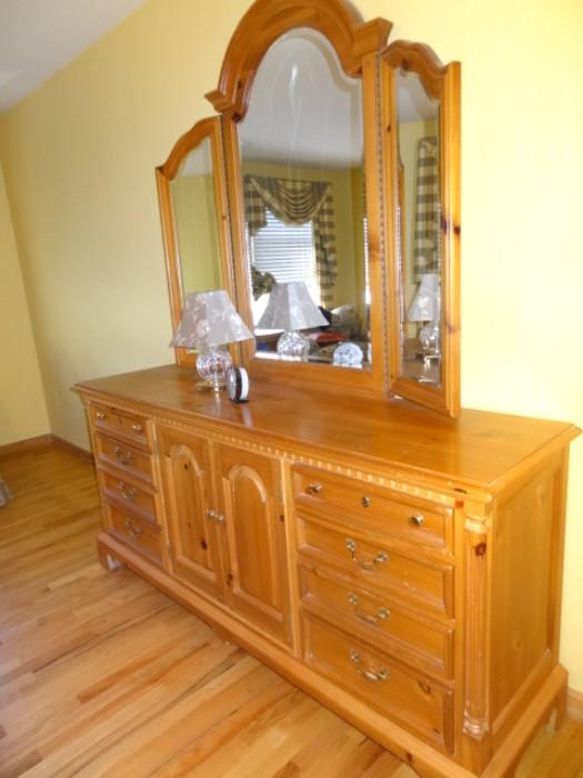Thomasville British Pine - Triple dresser with 3-Section mirror - Dresser measures 20"D X 74"W X34" H. Mirror measures - 51"H X 56"W 