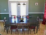 Amazing DR table measuring 60" x 92" and is 30" high. Seats 12 when fully expanded with both leaves installed.