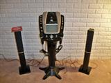 Kareoke Vision - The Singing Machine. Has CD & Graphics w/ 2 speakers and microphone.