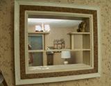 Vintage shadow box with a mirror background.