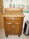 Portable butchers block. Bottom opens up and has two slide out drawers.