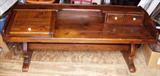 Oak coffee table with a couple of drawers.