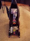 Bissell Proheat Clearview Plus - 12 Amps - Dirtlifter Powerbrush with upholstery tool and a water heater switch.