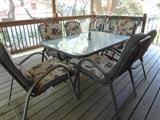 glass top patio table w/ 6 chairs