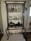 wrought iron baker's rack, Tiara "black diamond" glass, bottles