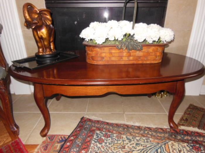 oval Queen Ann style coffee table