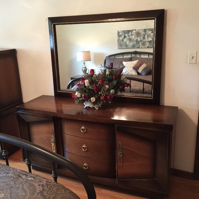 this is part of a 6 piece bedroom set from the 1960s antique excellent condition and strong and sturdy! includes 2 dressers,  mirror, 2 end tables and bed (which included mattress)  this is a one of a kind and hard to find type of set!! 