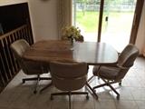 kitchen table with 4 chairs on wheels