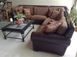 awesome leather and upholstery sectional and coffee table