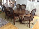 parquet top dining table and 6 caned back seats ... comes with 3 leaves!