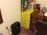 Yellow file cabinet, shredder, miscellaneous office items