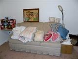 Decorative pillows, sofa, lamp, tins, comforters