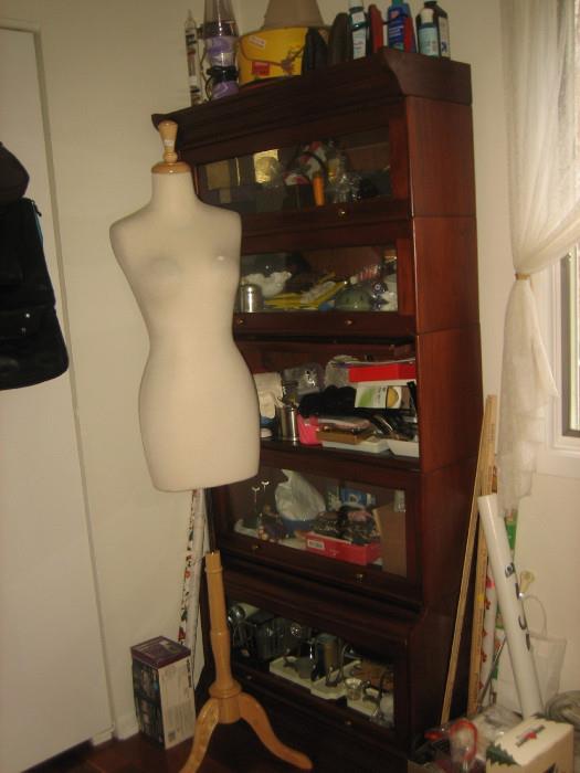 Shelzes packed with collectables, mannequin, curtains, drapes, iron, lamps, picturesm post cards, 