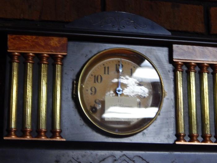 Another mantle clock with brass columns and great detail.