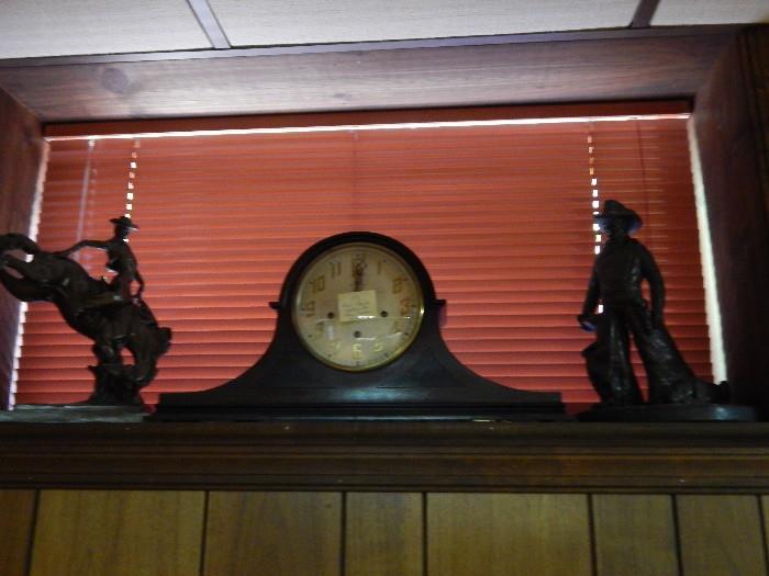 mantle clock and two sculptures