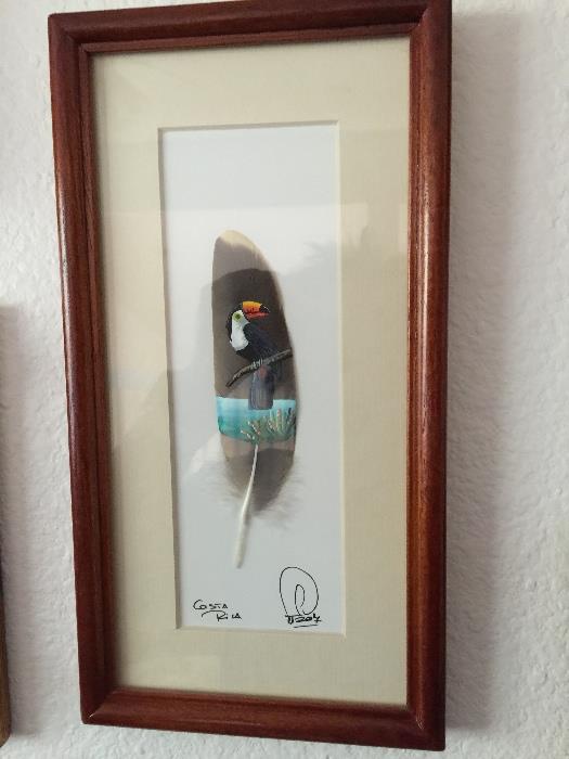 This bird is painted on a feather