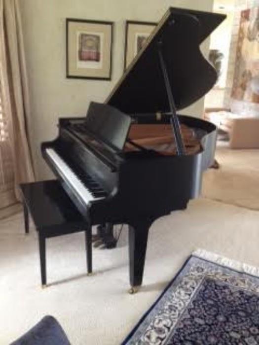 Beautiful Baby Grand Kawai Piano with a Satin Black Finish - Model #GE1; Serial #1960429 - in wonderful condition. 
