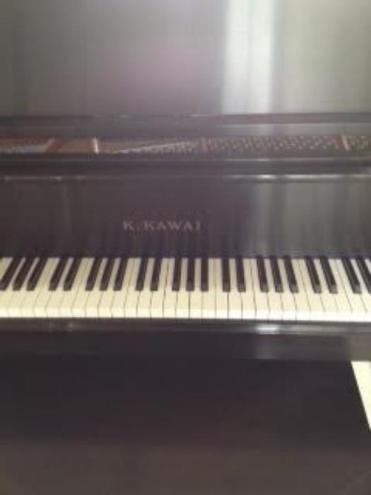 Beautiful Baby Grand Kawai Piano with a Satin Black Finish - Model #GE1; Serial #1960429 - in wonderful condition. 