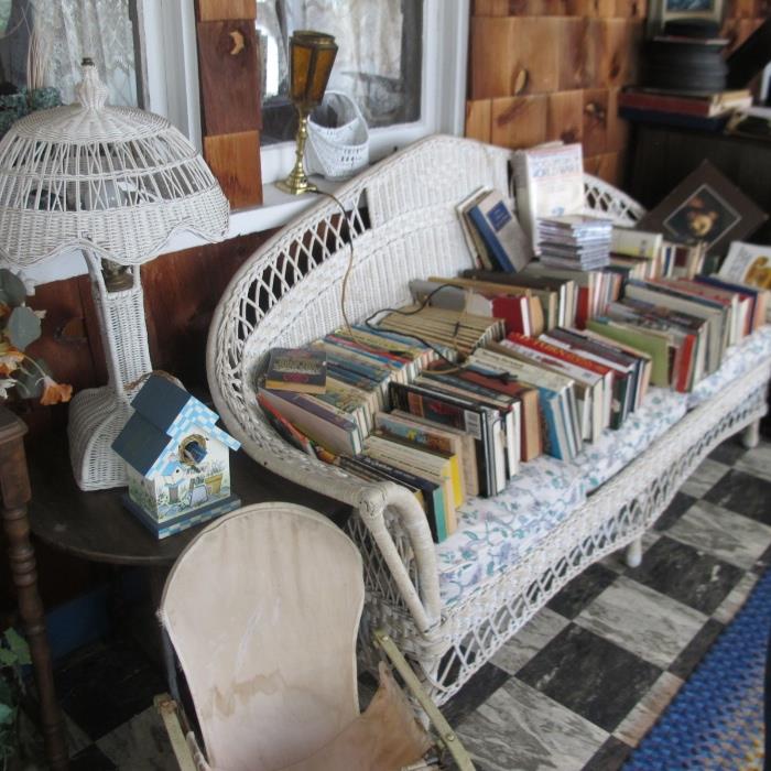 BOOKS AND ANTIQUE WICKER
