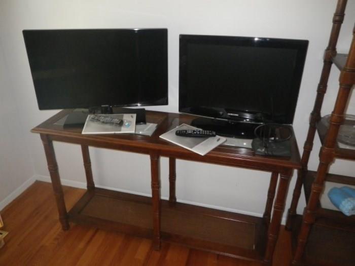 two flat screen televisions
