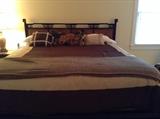 King size bed with an Asian-flair headboard
