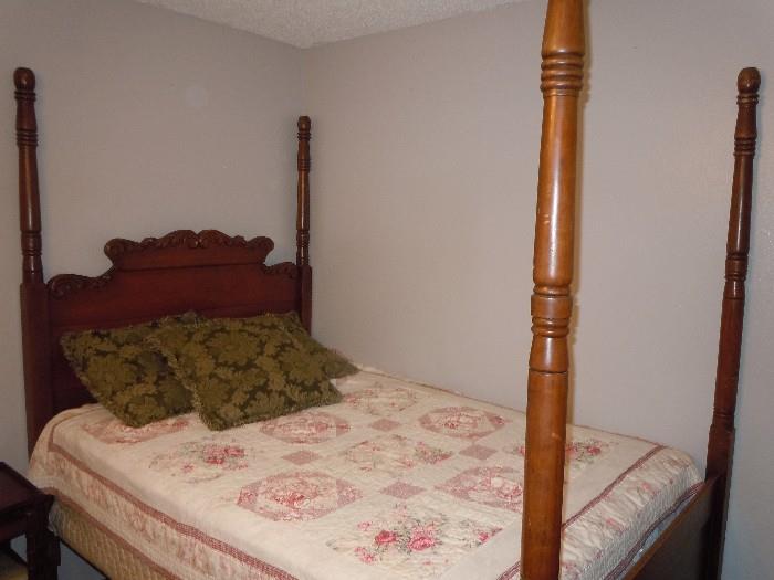 Walnut poster bed... fits full size mattress