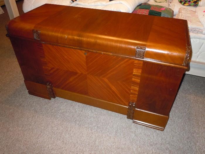 High cedar chest with hidden drawer