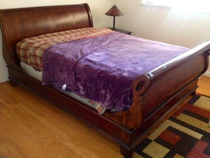 Side view of sleigh bed.
