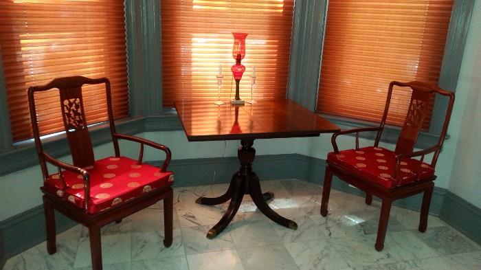 Duncan Phyfe mahogany drop leaf table, Cut Ruby glass lamp, Chinese Arm Chairs