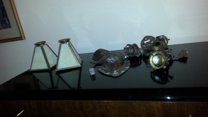 Bronze wall sconces, glass shades