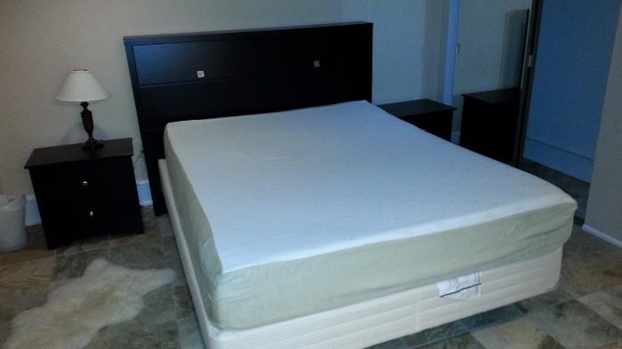 Double bed, headboard, side cabinets, rug