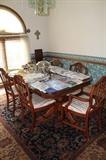 Dining room Duncan Phyfe stle table with six chairs, one has arms