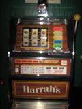 Harrah's Slot Machine...lights work but will need some repair to operate.  Still a fun prop, or repair to create your own home casino!!