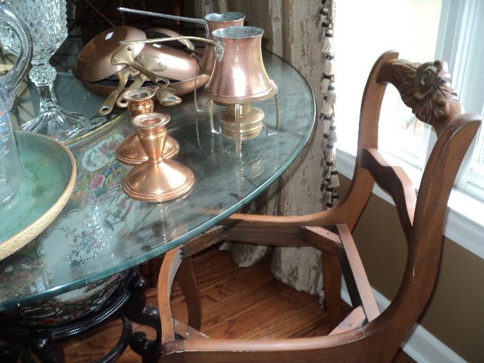 Top view of the fish bowl table... look at all of that copper!  Also,  take a good look at the antique rose carved chair (there are 4 of these chairs)