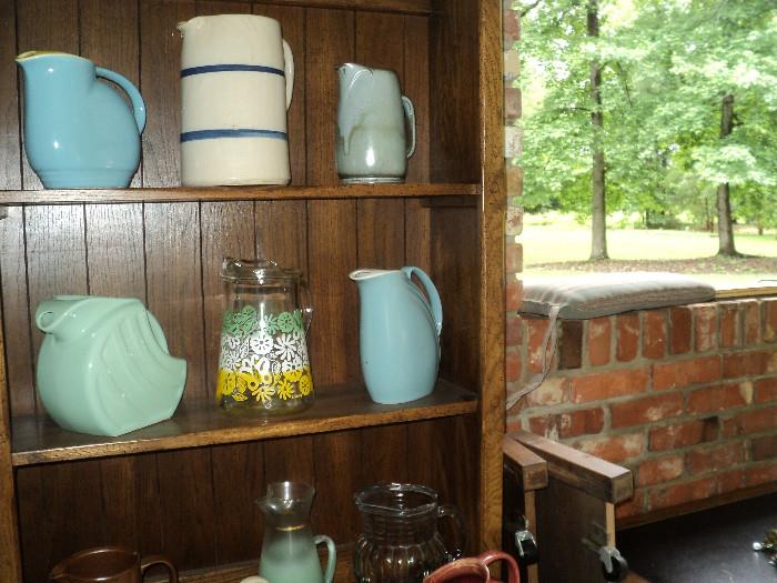 Just some of the huge collection of antique pitchers from the Nichols estate!