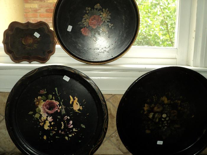 Antique hand-painted metal trays.... these are "in" as collectibles!