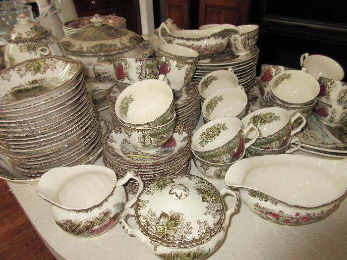 A very large set of JOhnson Bros. Friendly Village dinnerware, we have a coffee pot, a tea pot, several large platters and a soup tureen.