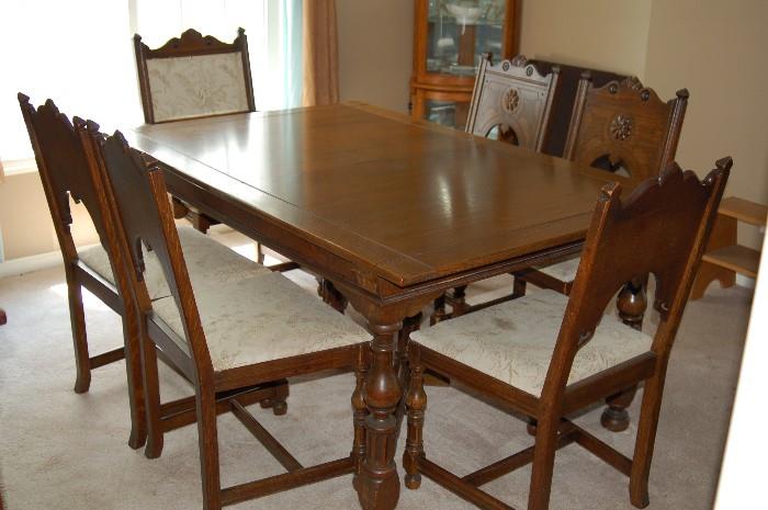Antique dining room table and chairs