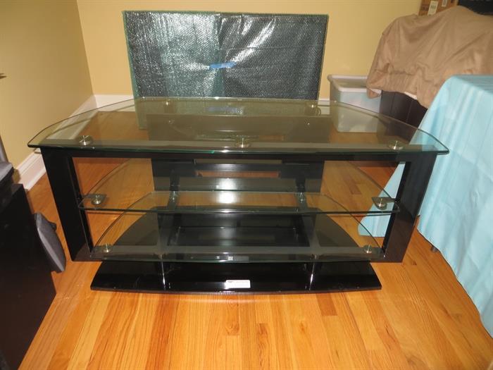 Glass and black TV stand